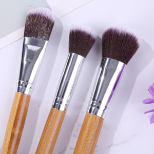 11 bamboo handles, makeup brush, tool set, linen bag, blush brush, foundation brush, and a full set of makeup.