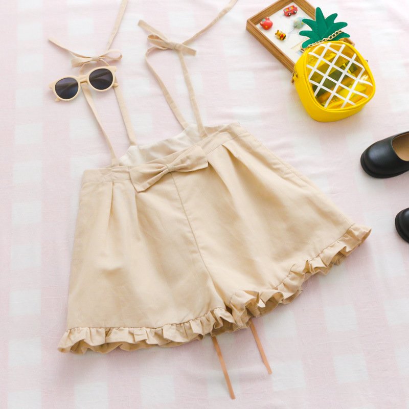 Bow-tied flounces with suspenders