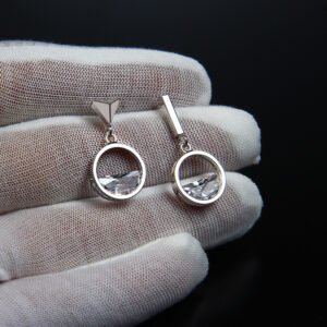 Zircon asymmetrical earrings