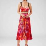 Holiday Style Halter Vest + Printed High-Waisted Pleated Skirt