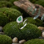 925 Sterling Silver Elegant Pear-Cut Emerald Bypass Ring with Dazzling CZ Halo and Baguette Accents