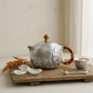 Pure 999 Fine Silver Handcrafted Silver Teapot with Intricate Floral Engravings and Amber-Toned Handle - Handicraft